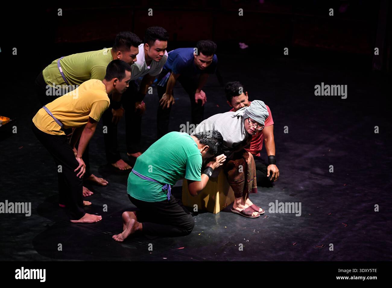 Members of the troop pay hommage to lead character Sokha during the Phare circus show of the same name in Siem Reap, Cambodia. Stock Photo