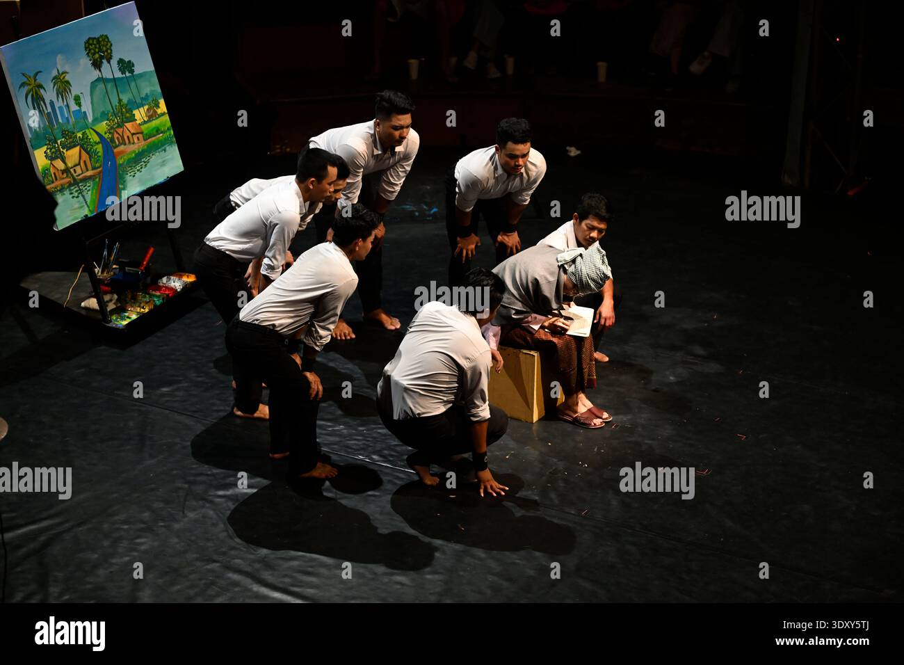 Members of the troop pay hommage to lead character Sokha during the Phare circus show of the same name in Siem Reap, Cambodia. Stock Photo