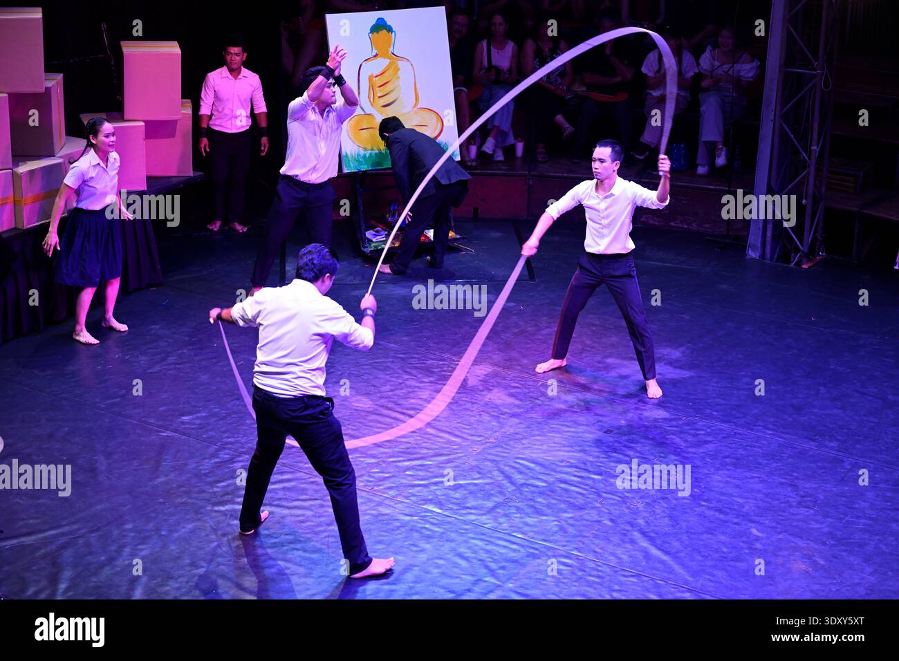 A circus troop performs a skipping act in the Phare circus production of Sokha in Siem Reap, Cambodia. Stock Photo