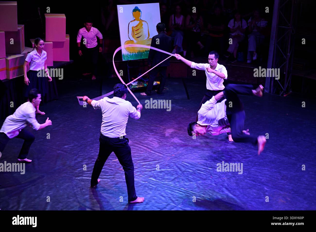A circus troop performs a skipping act in the Phare circus production of Sokha in Siem Reap, Cambodia. Stock Photo