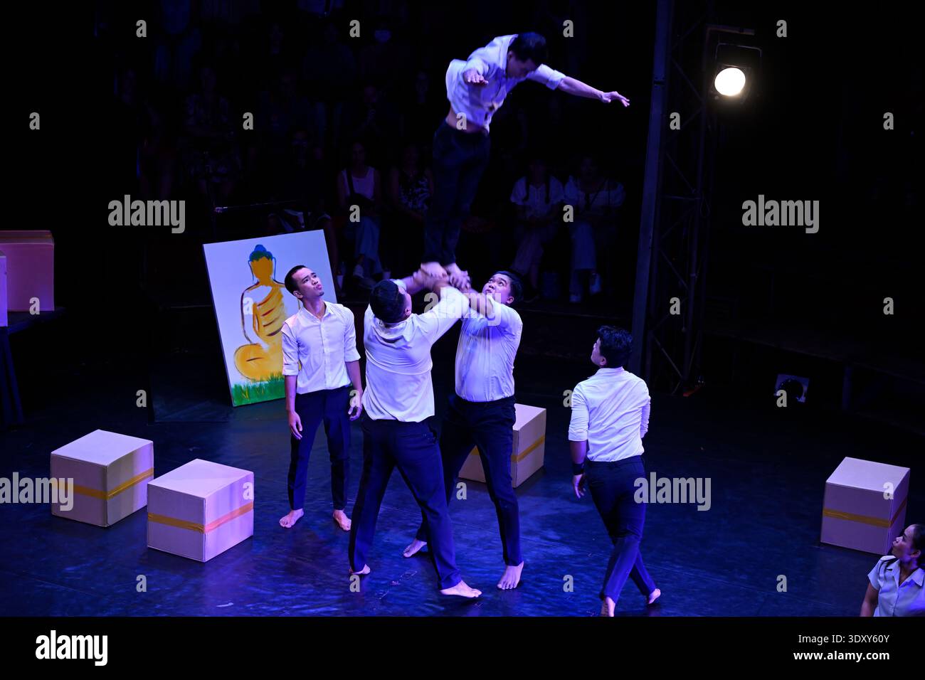 A circus acrobat performs during the Phare circus production of Sokha in Siem Reap, Cambodia. Stock Photo