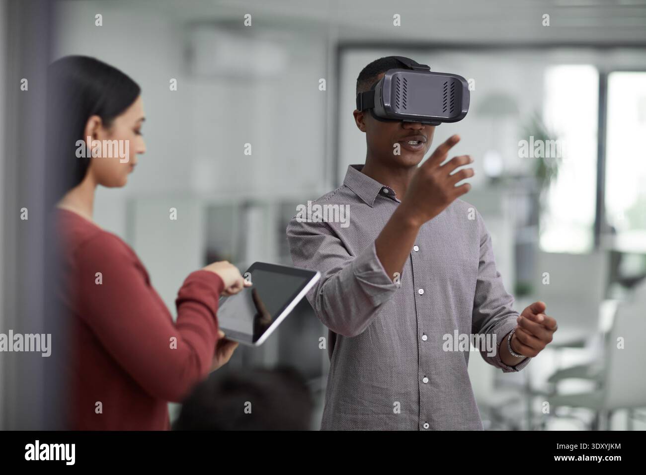 VR, glasses or people with tablet screen in office, testing or demo evaluation for engineering research. Prototype trial, tech or developer with Stock Photo