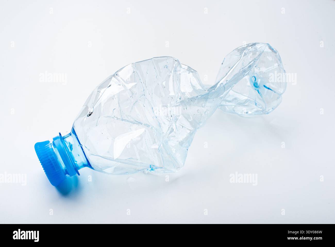 Crumpled plastic bottle on a white background Stock Photo