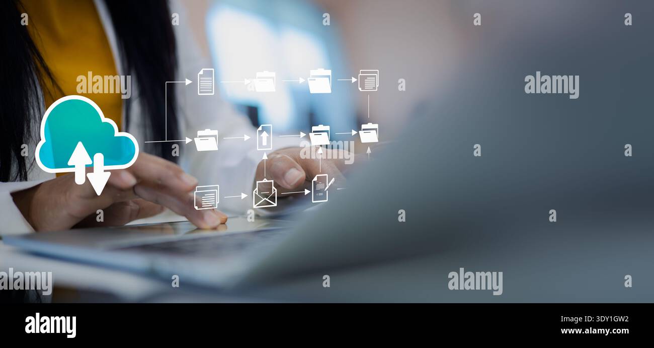 Businesswoman using laptop for cloud computing technology and digital document management system, online data storage, and efficient workflow automati Stock Photo