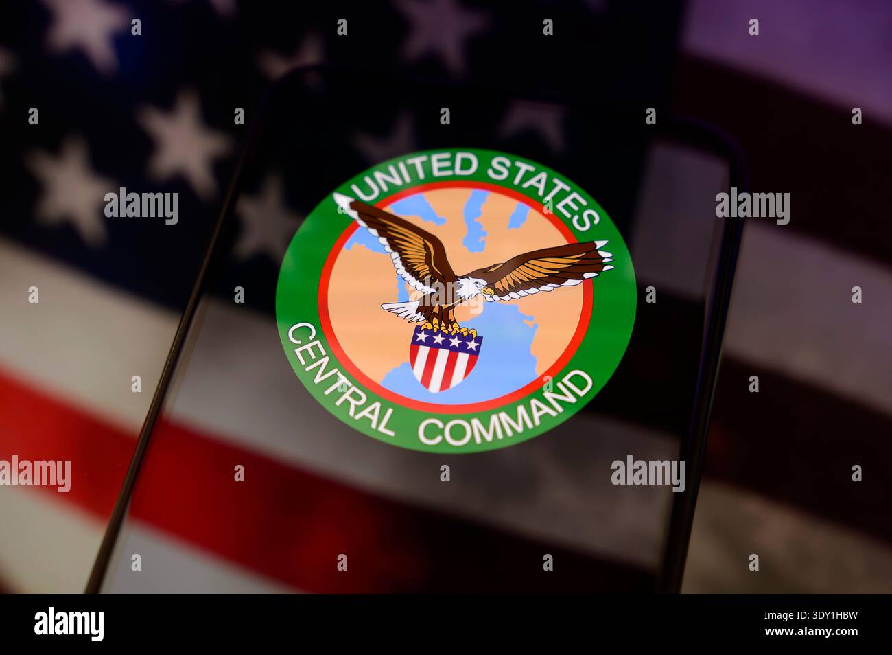 Paris, France - March 5, 2026: The United States Central Command (CENTCOM) logo displayed on a smartphone screen with the US flag in the background. Stock Photo