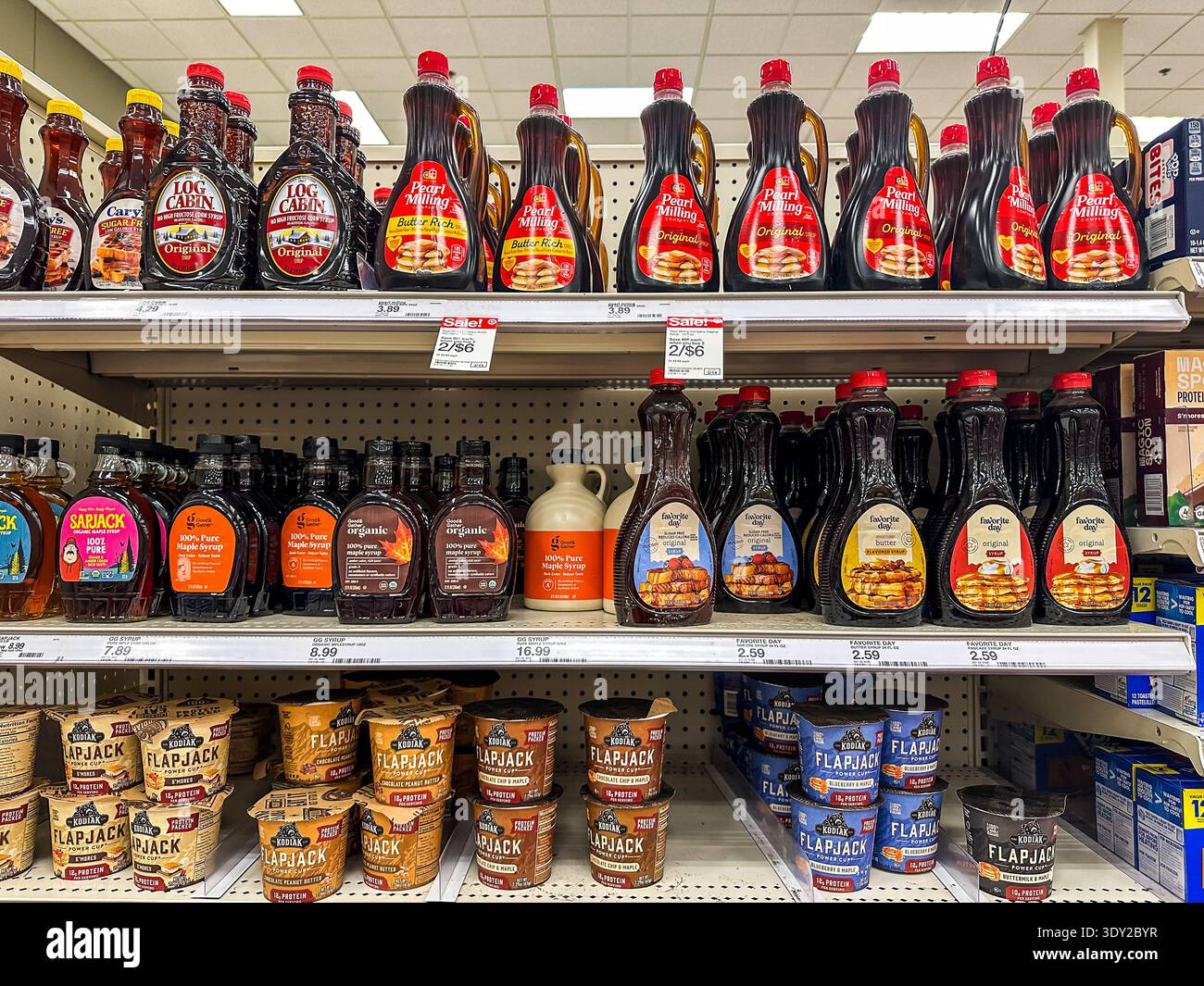 Assortment of breakfast syrups on a store shelf - Smartphone Captured Stock Image
