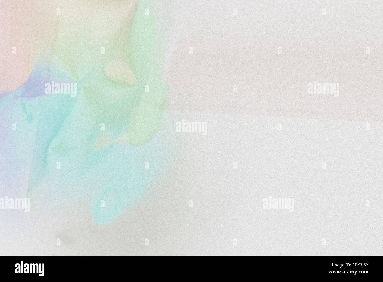 Rainbow Paper Crumpled on White Surface Stock Photo