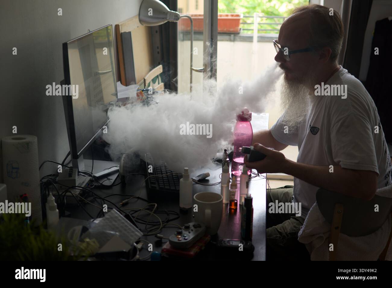 Exhaling vape cloud hi-res stock photography and images