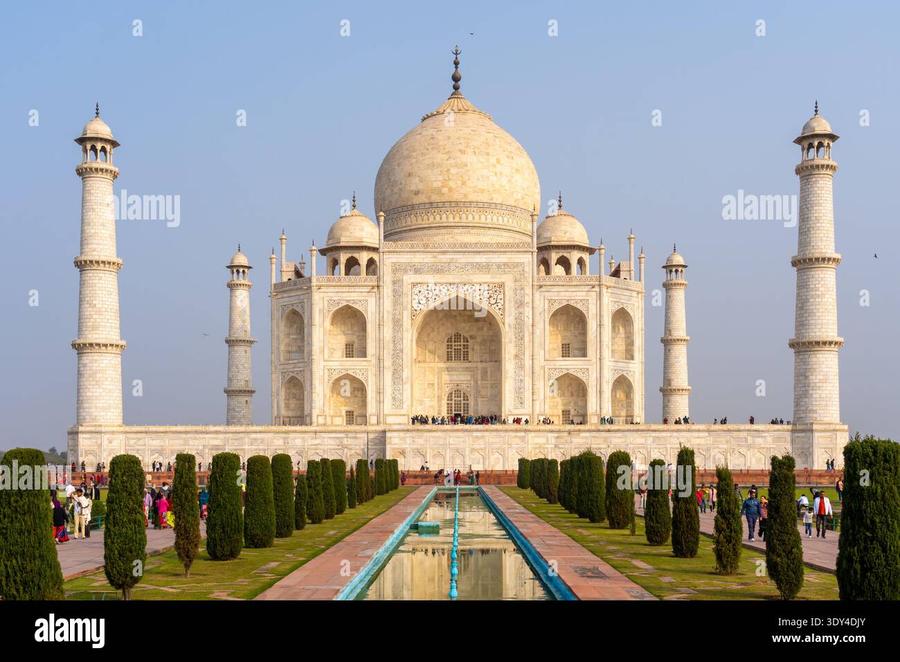People visiting Taj Mahal with reflecting Pool in Agra, India. Stock Photo