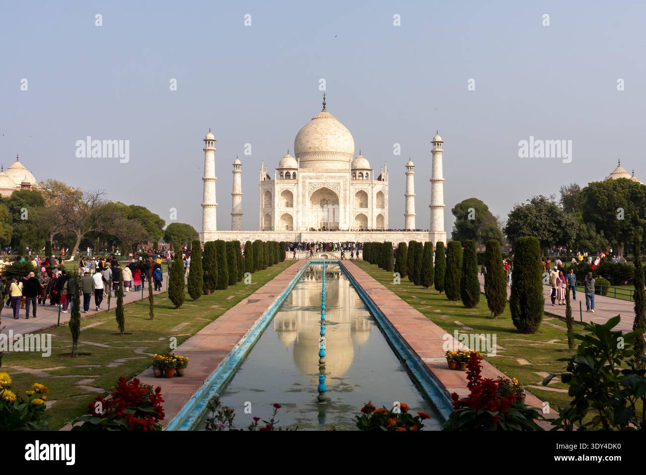 People visiting Taj Mahal with reflecting Pool in Agra, India. Stock Photo