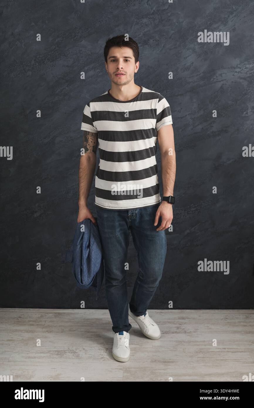 Handsome stylish man posing in studio Stock Photo