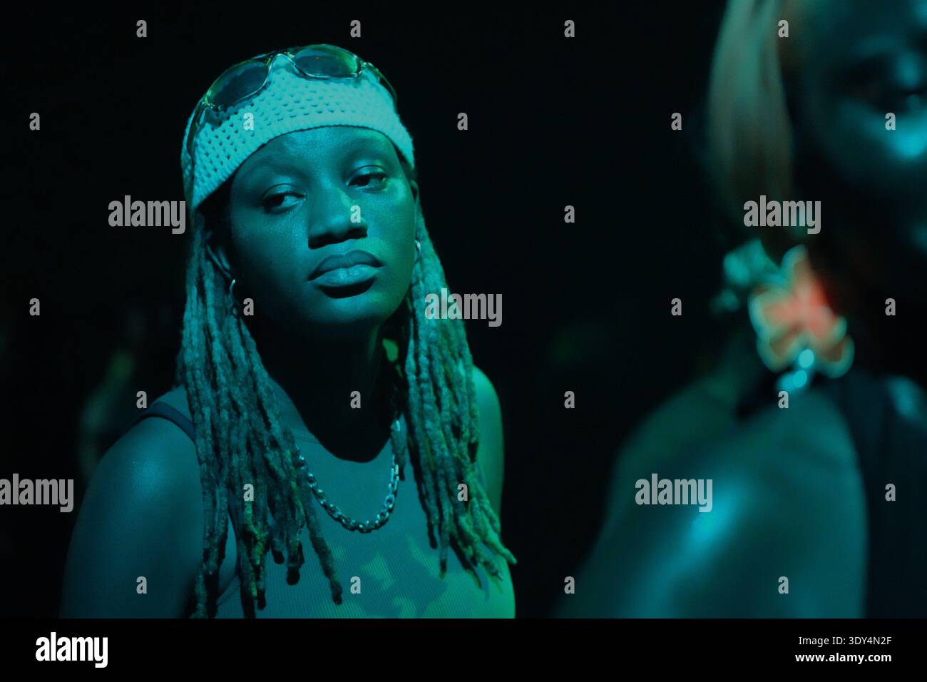 DJ Aniko dances before performing at a Group Therapy rave in Lekki, an ...