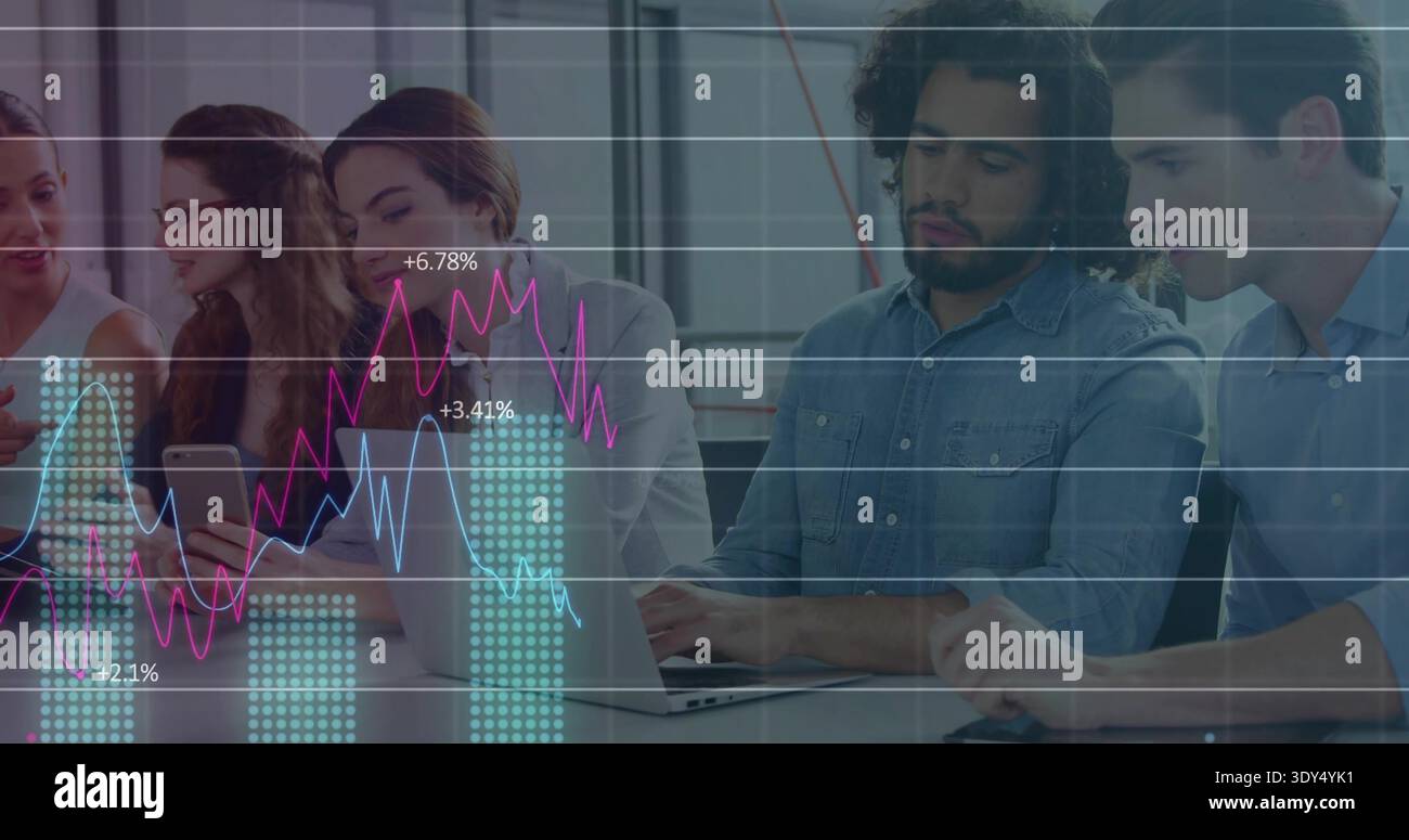 Collaborating five colleagues wearing biz casual analyzing charts in office on laptop and phone Stock Photo