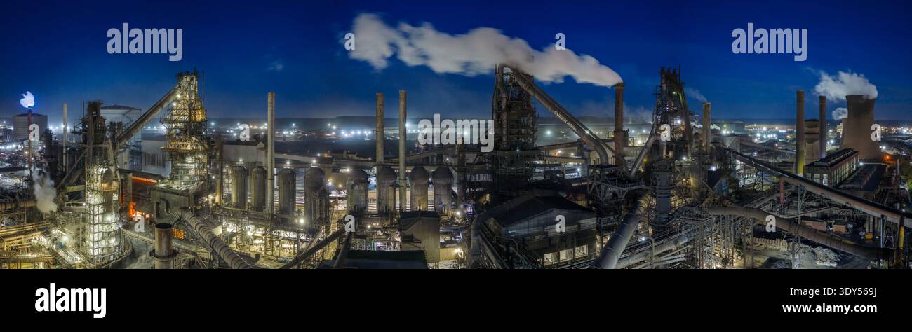 Scunthorpe Steel Works at twilight, Panoramic image of the steel works showing blast furnaces in Scunthorpe. Stock Photo
