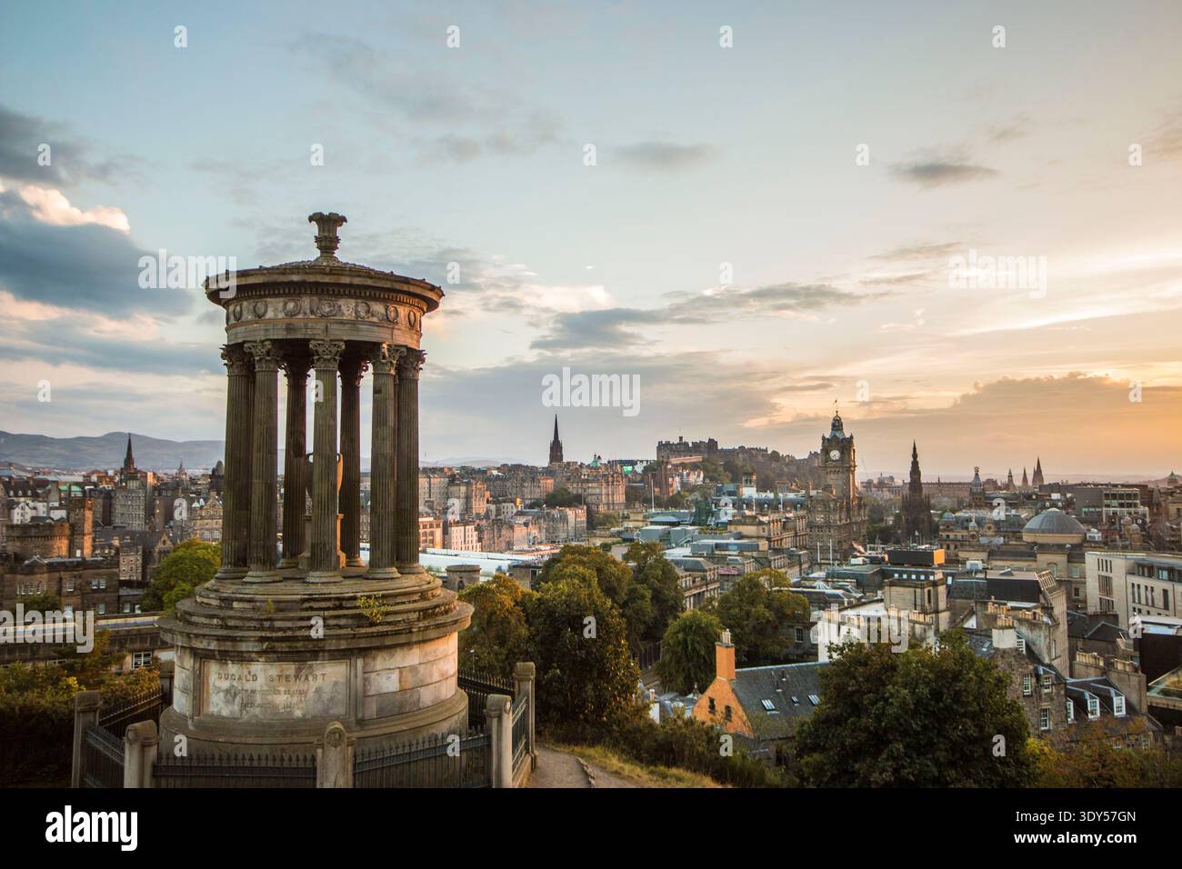 Sunset Over Edinburgh From Calton Hill Featuring The Nelson Monument sunset-over-edinburgh-from-calton-hill-featuring-the-nelson-monument