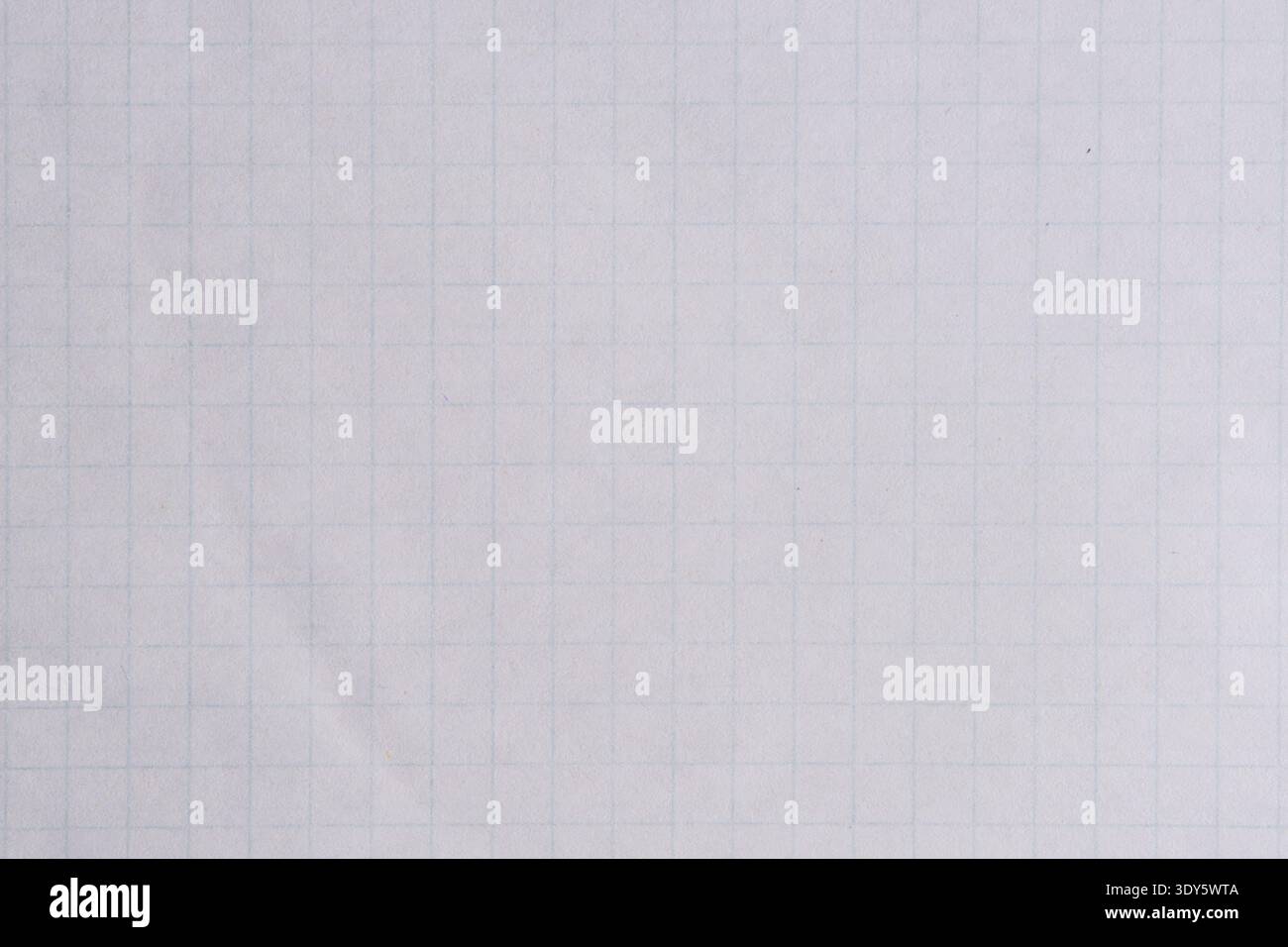 Close up plain, light colored piece graph paper, showing simple, clean grid pattern Stock Photo
