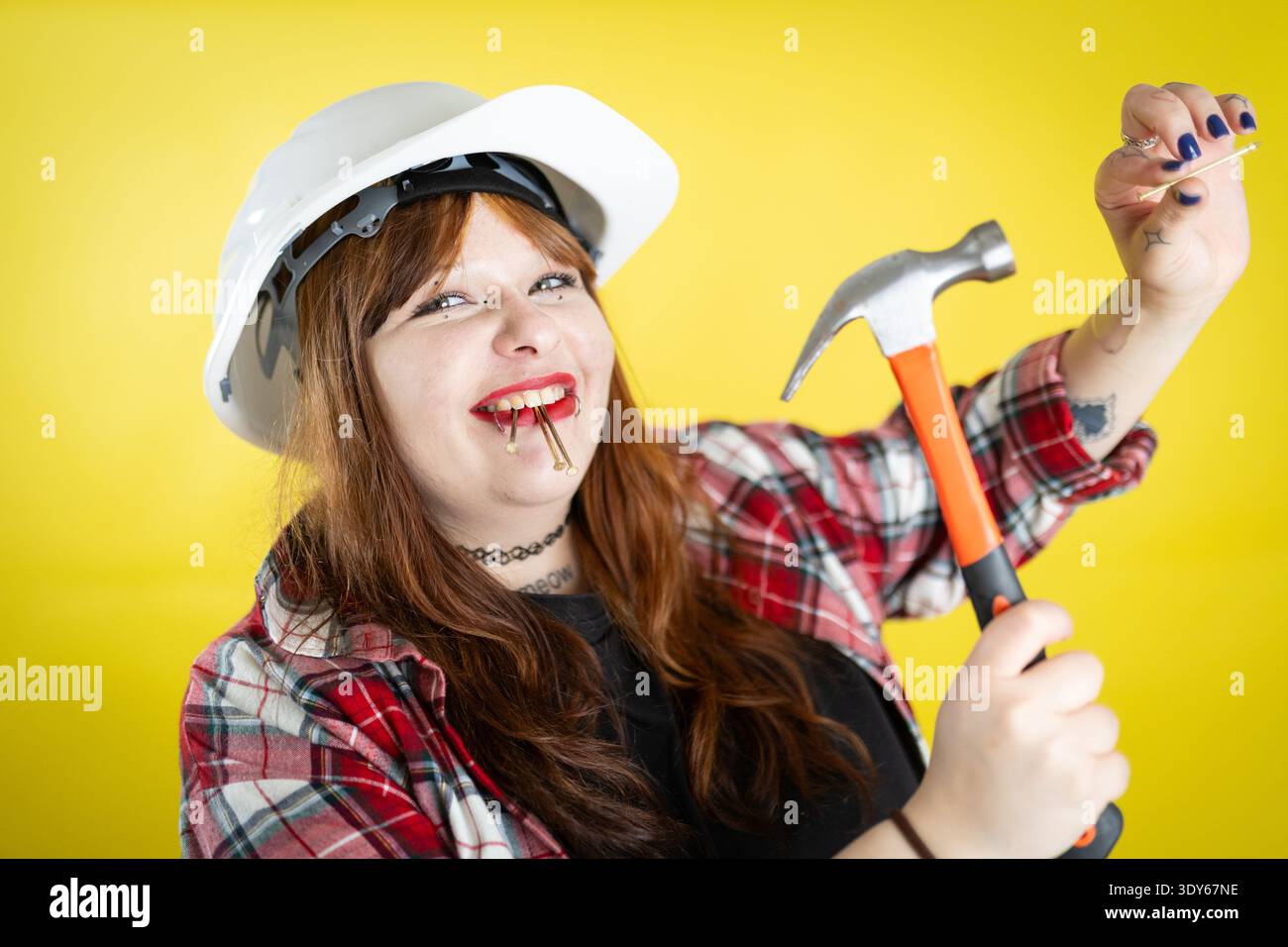 Young woman ready for do it yourself construction Stock Photo
