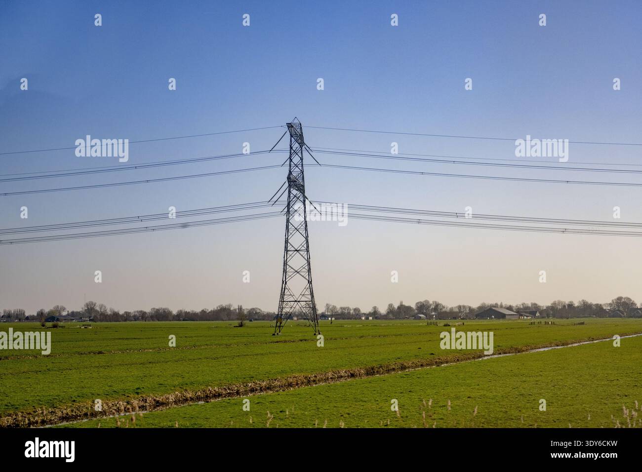 Atached Pylon UTRECHT - High-voltage pylons dot the landscape. Electrical energy is ...