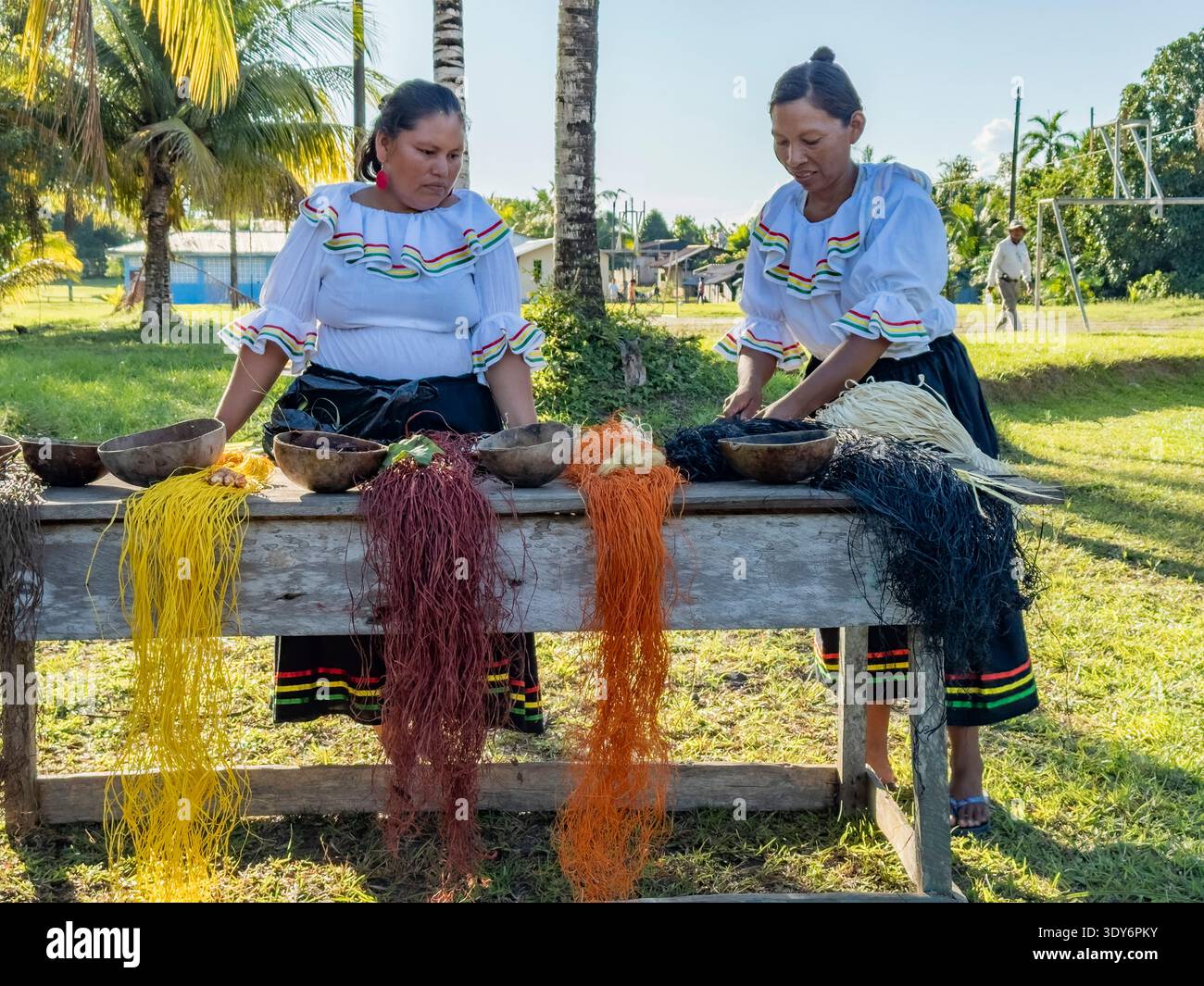 Women demonstrate basket weaving techniques in Amazonas region of Peru with materials and colors from nature Stock Photo