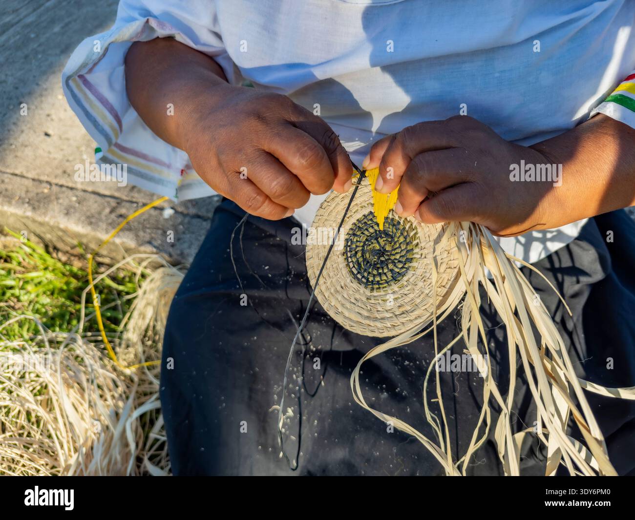 Basket weaving demonstration by women from Minga Peru in Amazonas Loreto Stock Photo