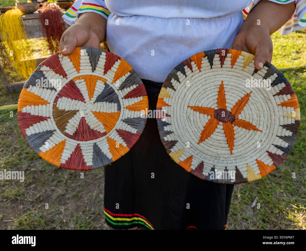 Basket weaving demonstration by women from Minga Peru in Amazonas, Peru, highlighting traditional crafts and skills Stock Photo