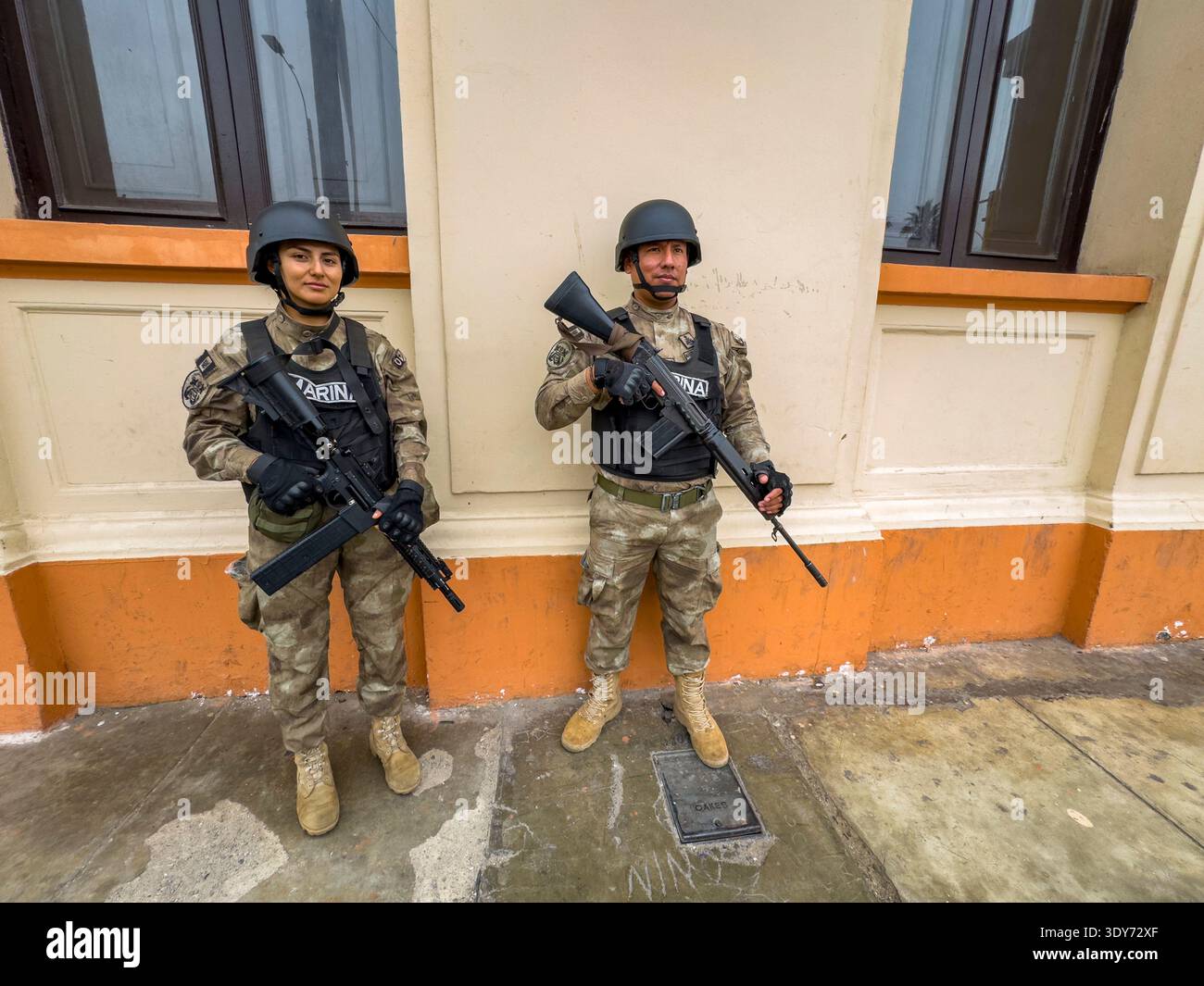 Security personnel guard the Captain of the Port office at Callao ...