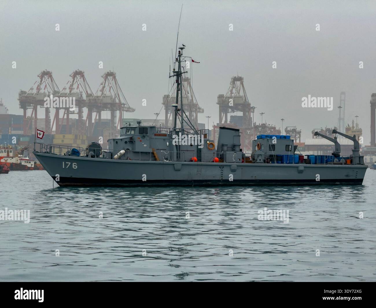 Scenes of naval activity at Callao Harbor with cargo cranes in the background near Lima, Peru Stock Photo