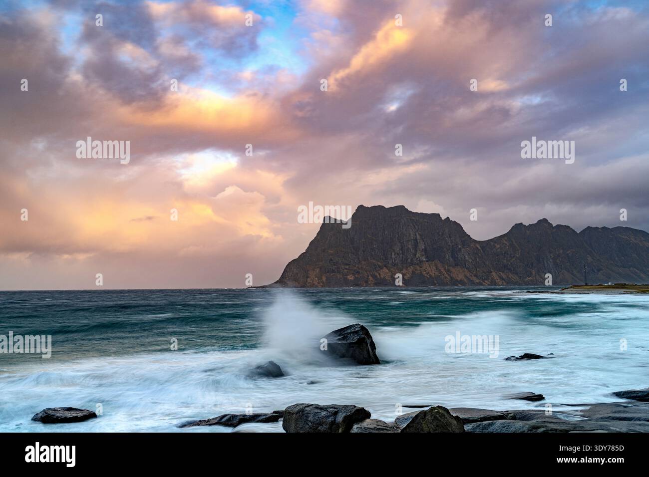 Sunset over rocky coastline hi-res stock photography and images - Alamy