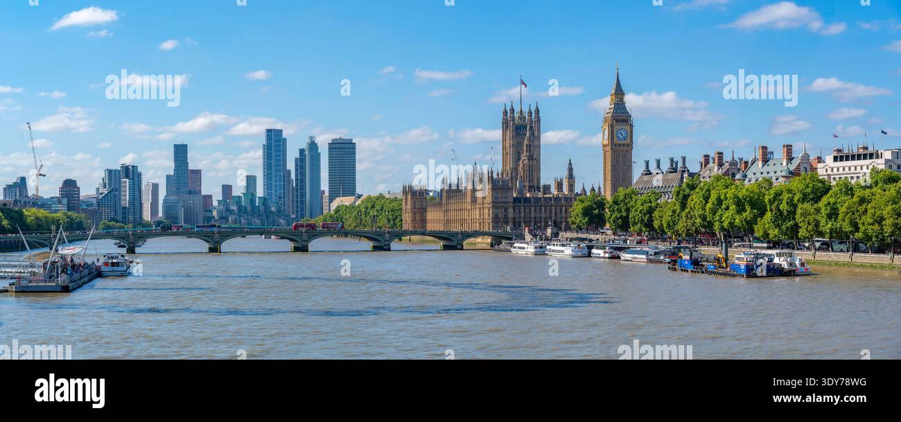 View of Houses of Parliament and Big Ben clocktower from Golden Jubilee Bridge during summer in Westminster London Stock Photo