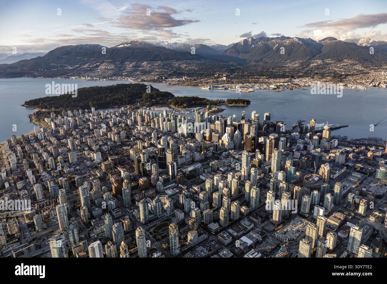 Aerial view of downtown Vancouver with Stanley Park, Burrard Inlet, and ...