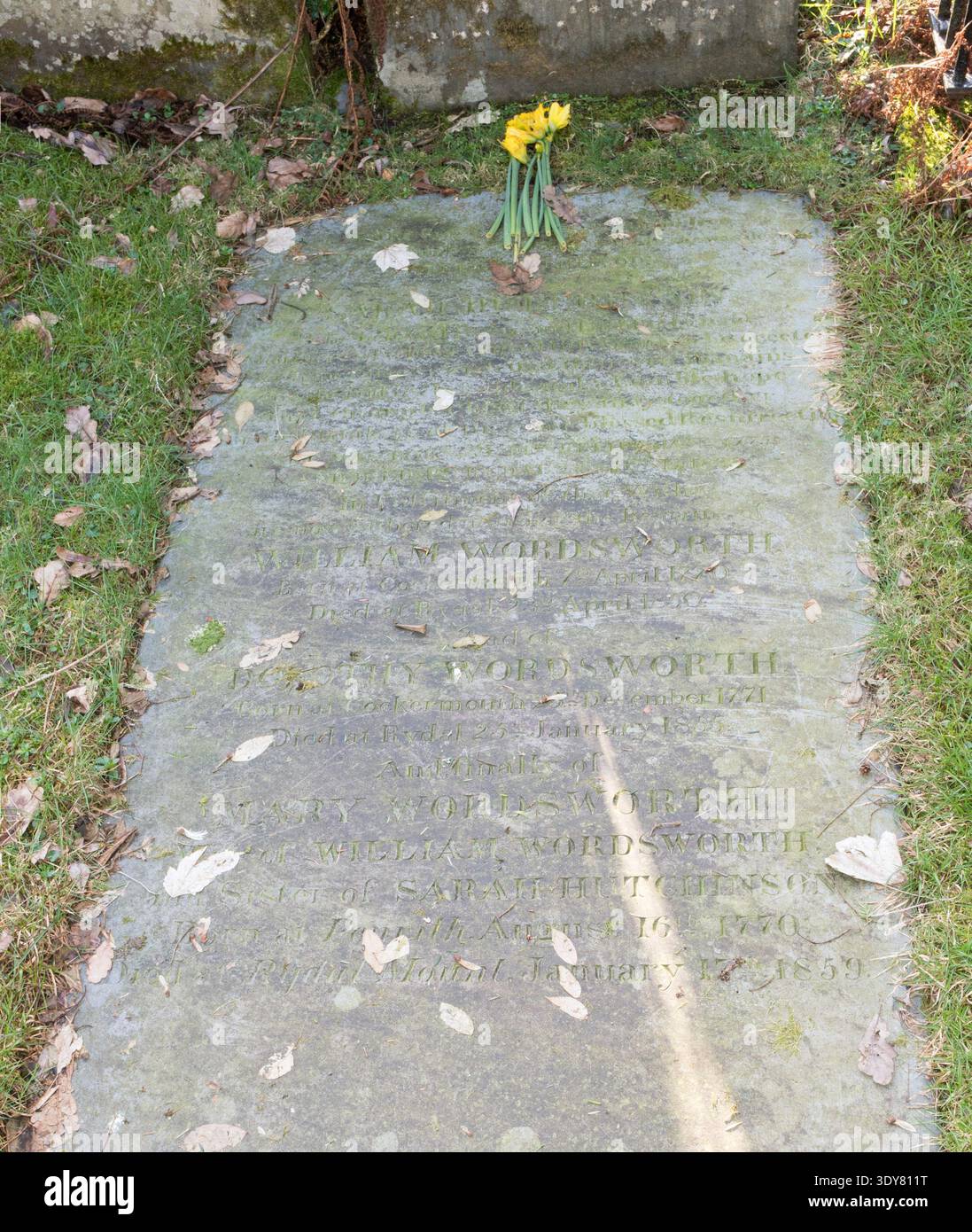 The grave of William Wordsworth in St Oswald's Churchyard, Grasmere, Cumbria, England, UK Stock Photo
