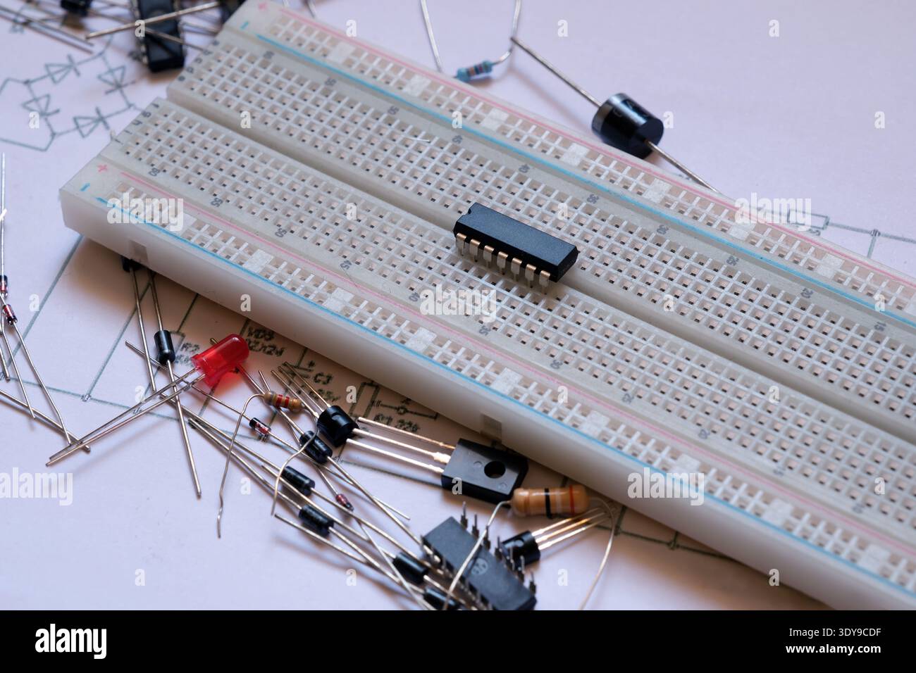 Electronic project start. Electronic circuit basics. Integrated circuit on the breadboard. Stock Photo