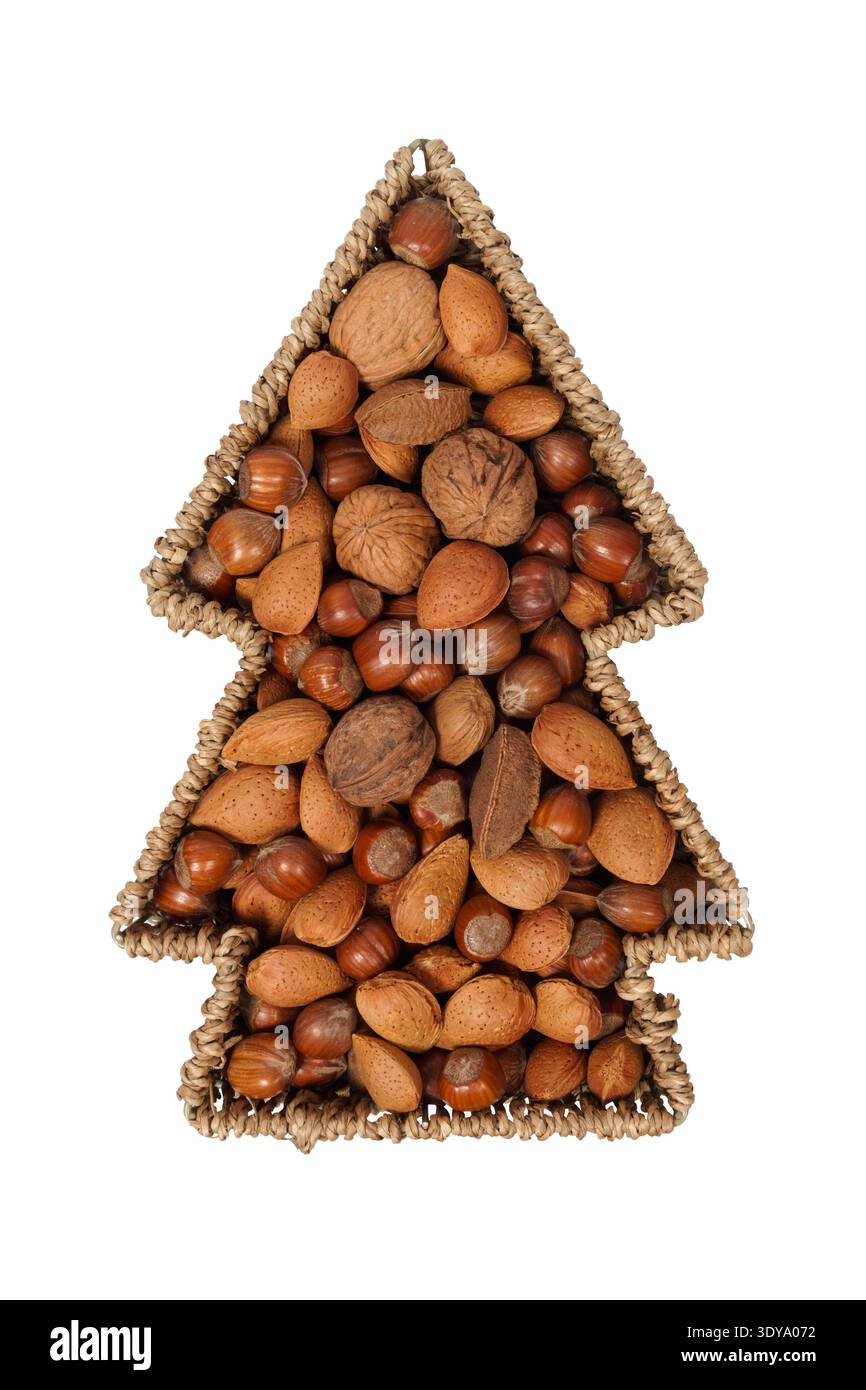 Christmas tree shape basket with nuts isolated on white Stock Photo