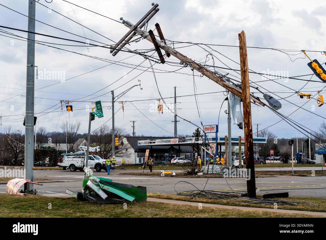 Damage is seen to power lines and traffic signals after a reported ...