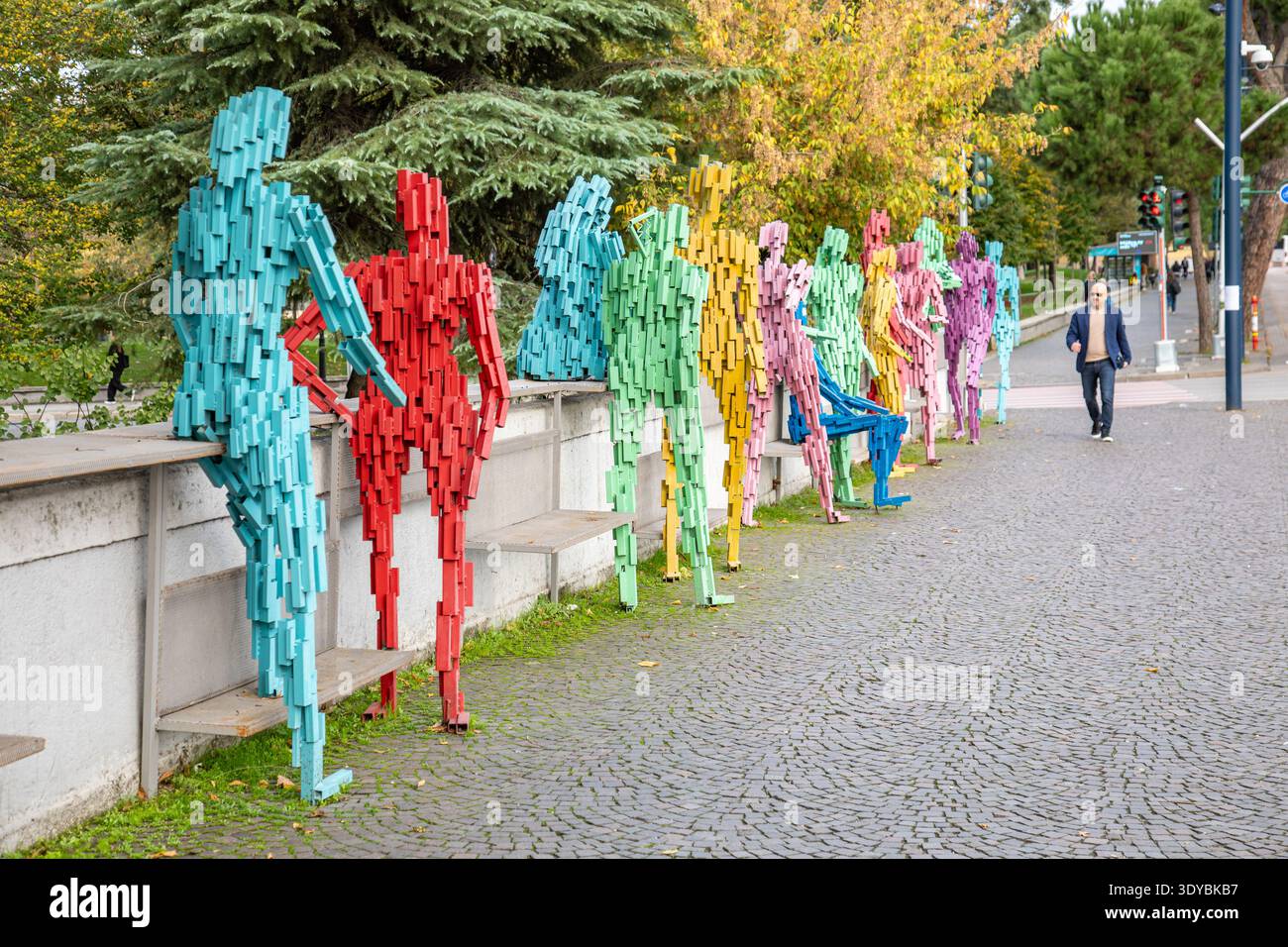 Public art installation of colorful human sculptures in Tirana, Albania Stock Photo