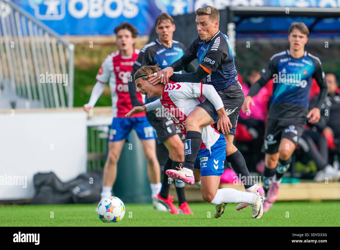 Oslo 20260307. KFUM Oslo's Teodor Berg Haltvik and Tromsø's Ruben
