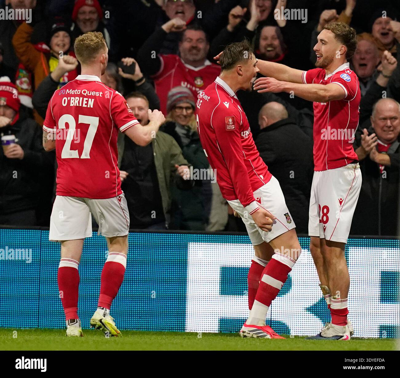 Wrexham, Wales, 7th March 2026. Wrexham's Sam Smith (R) celebrates ...