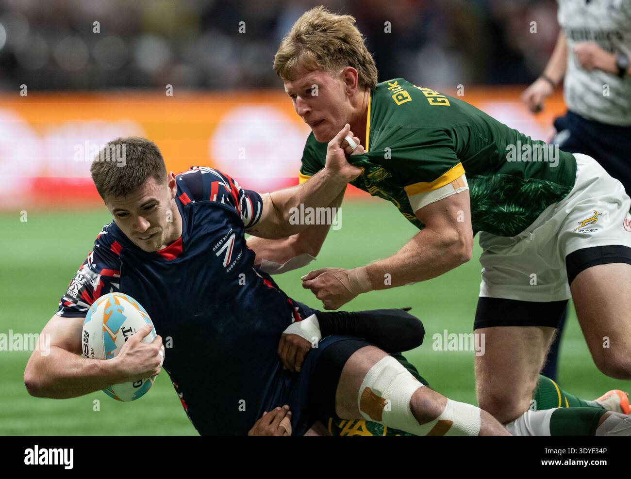 Ross Kerr Rugby Great Britain's Charlton Kerr, left, grabs South Africa's Christie ...
