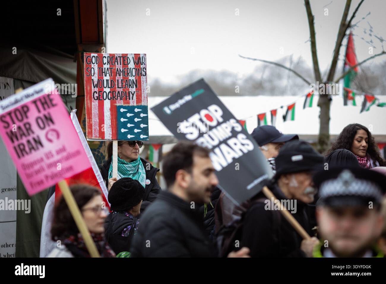 Protesters holding placards gather outside the American Embassy during ...