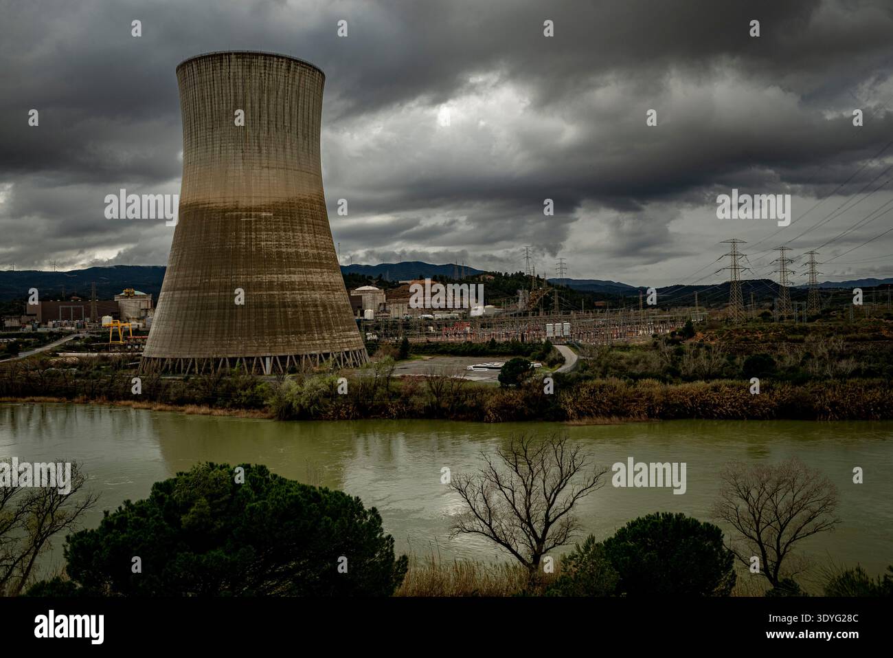 Cooling tower of the Asco nuclear power plant on the banks of the Ebro  River near Asco, northeastern Spain. The complex has two reactors, Asco I  and Asco II, and is part