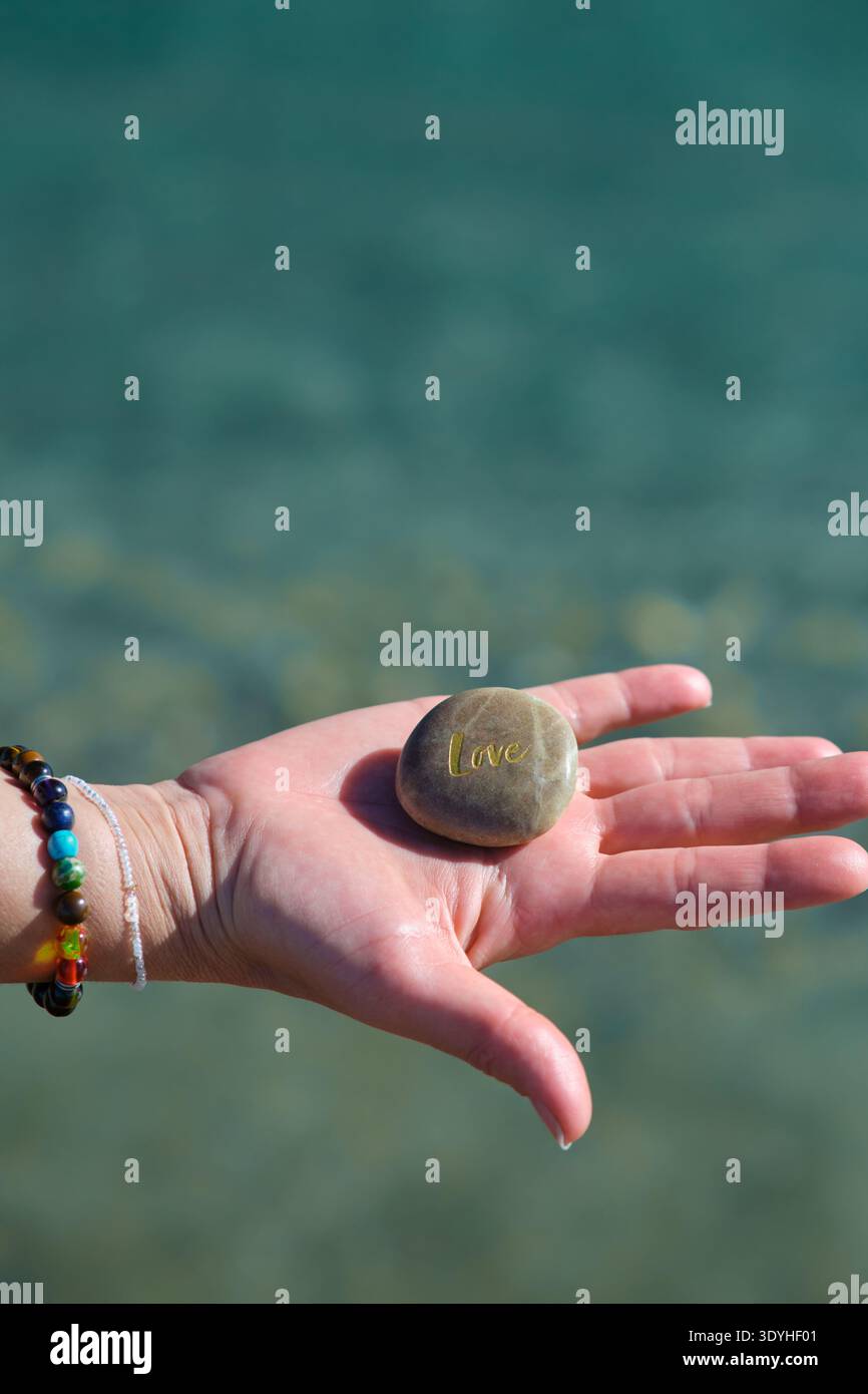 Holding heart rock hi-res stock photography and images - Alamy