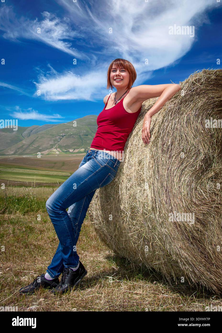 Wearing red top and blue jeans hi-res stock photography and images - Alamy