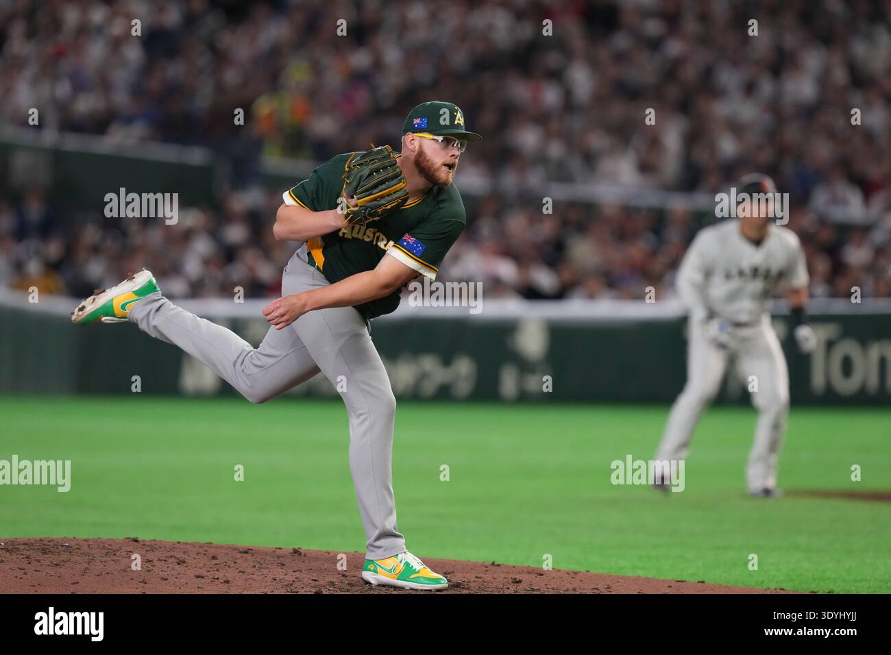 Australia's pitcher Blake Townsend pitches to a Japan batter during the ...