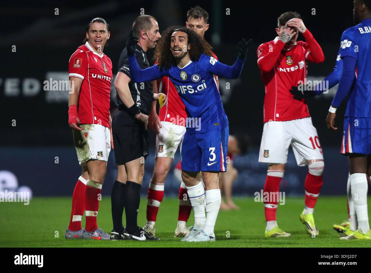marc-cucurella-of-chelsea-gestures-to-linesman-blake-antrobus-during