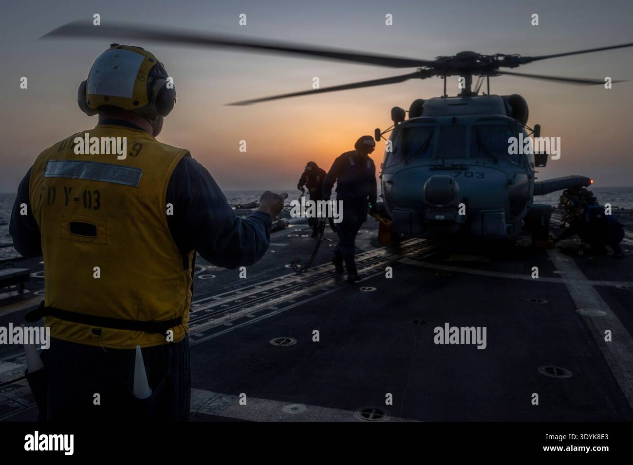 A U.S. Sailor assigned to Arleigh Burke-class guided-missile destroyer ...