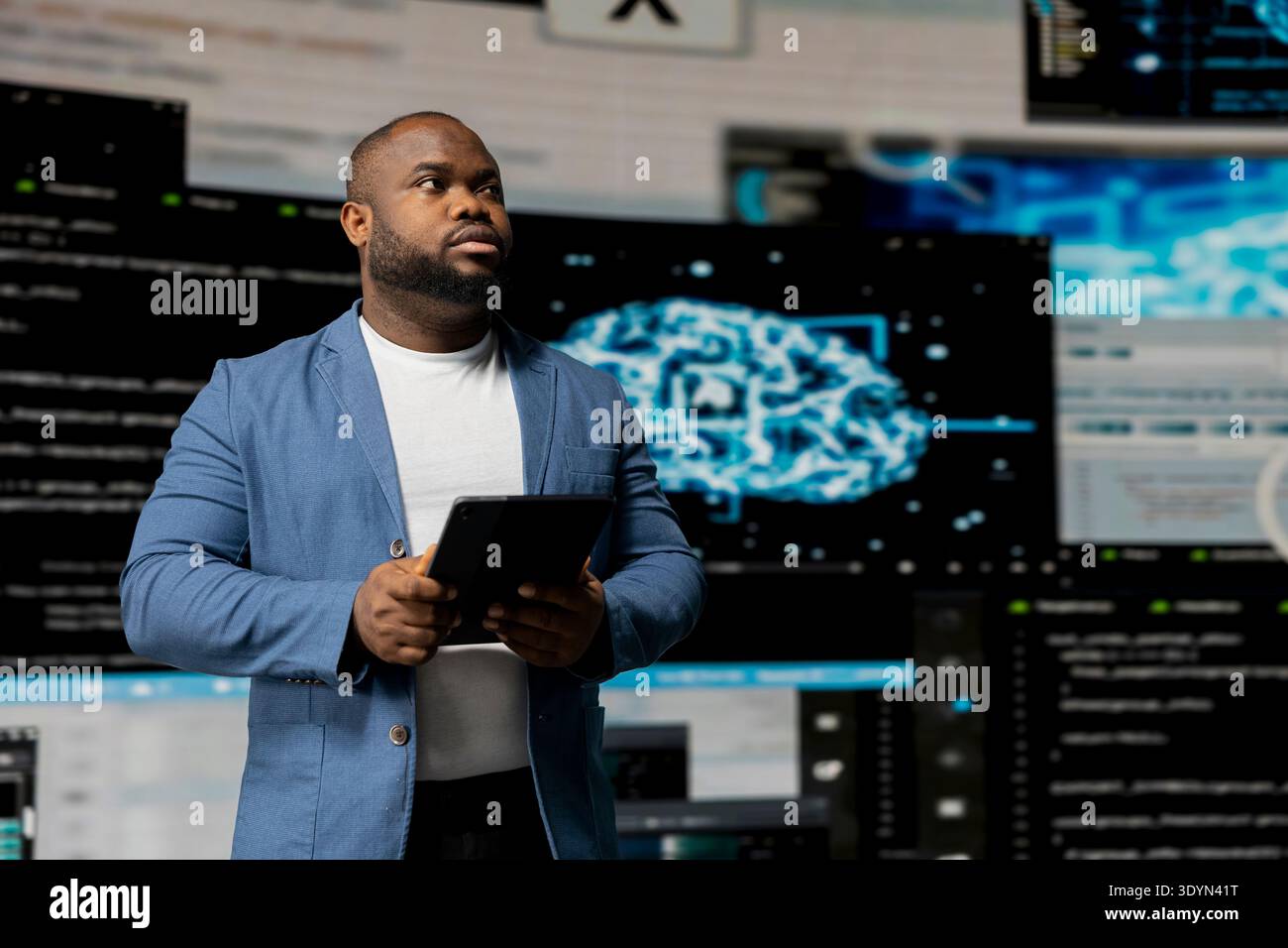 Black software expert focusing on programming language for innovation, reading binary code on terminal window. Reviews code development for data science. Modern futuristic coding life. Stock Photo