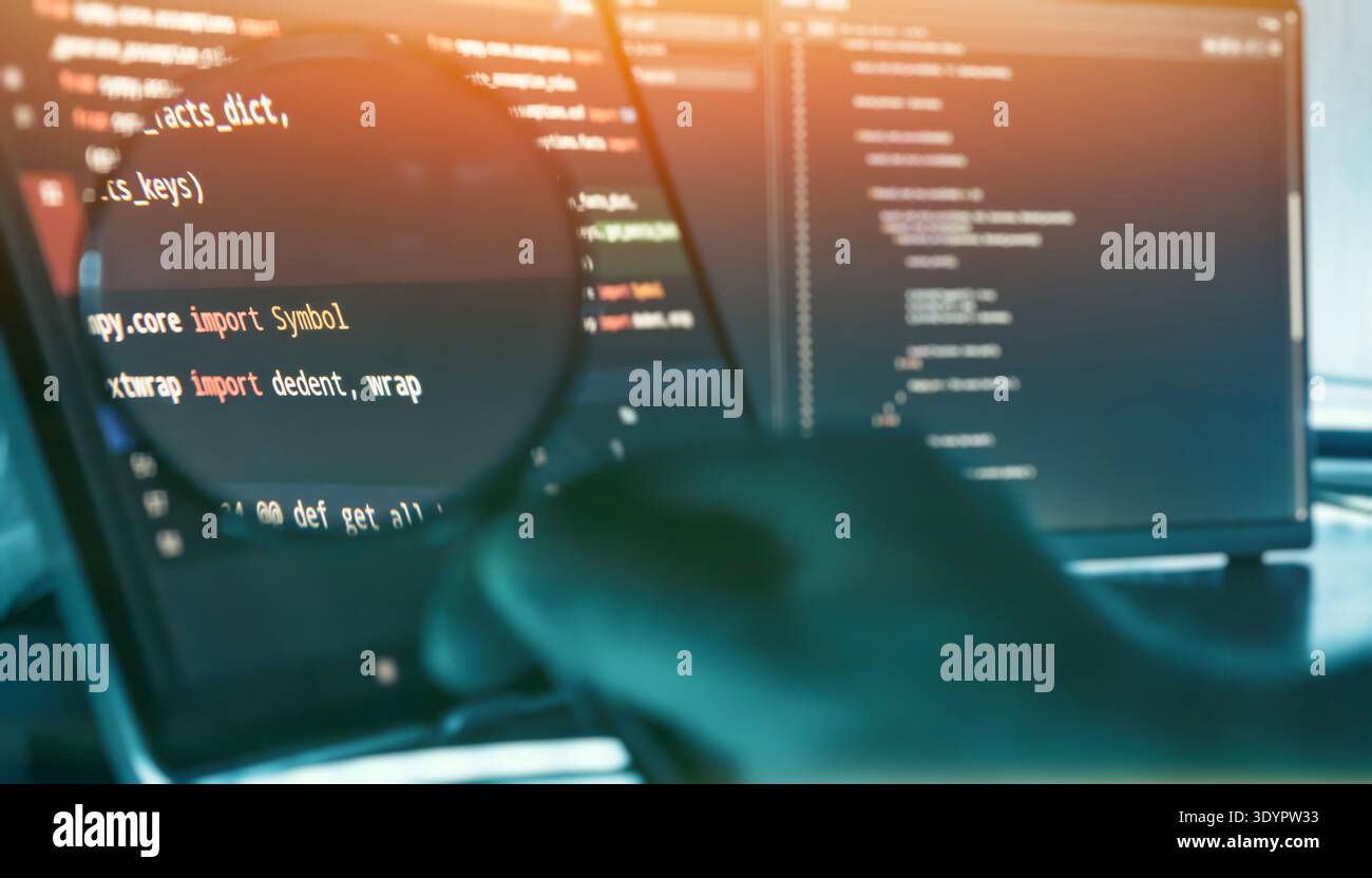 Programmer Reviewing Source Code Through Magnifying Glass on Futuristic Stock Photo