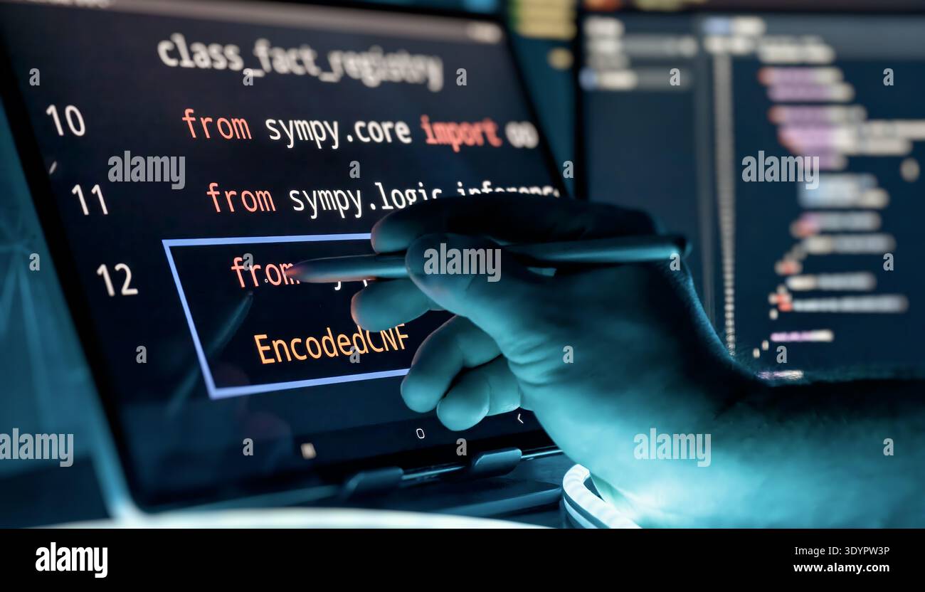 Programmer Editing Source Code with Stylus on Touchscreen in Futuristic Software Development Stock Photo