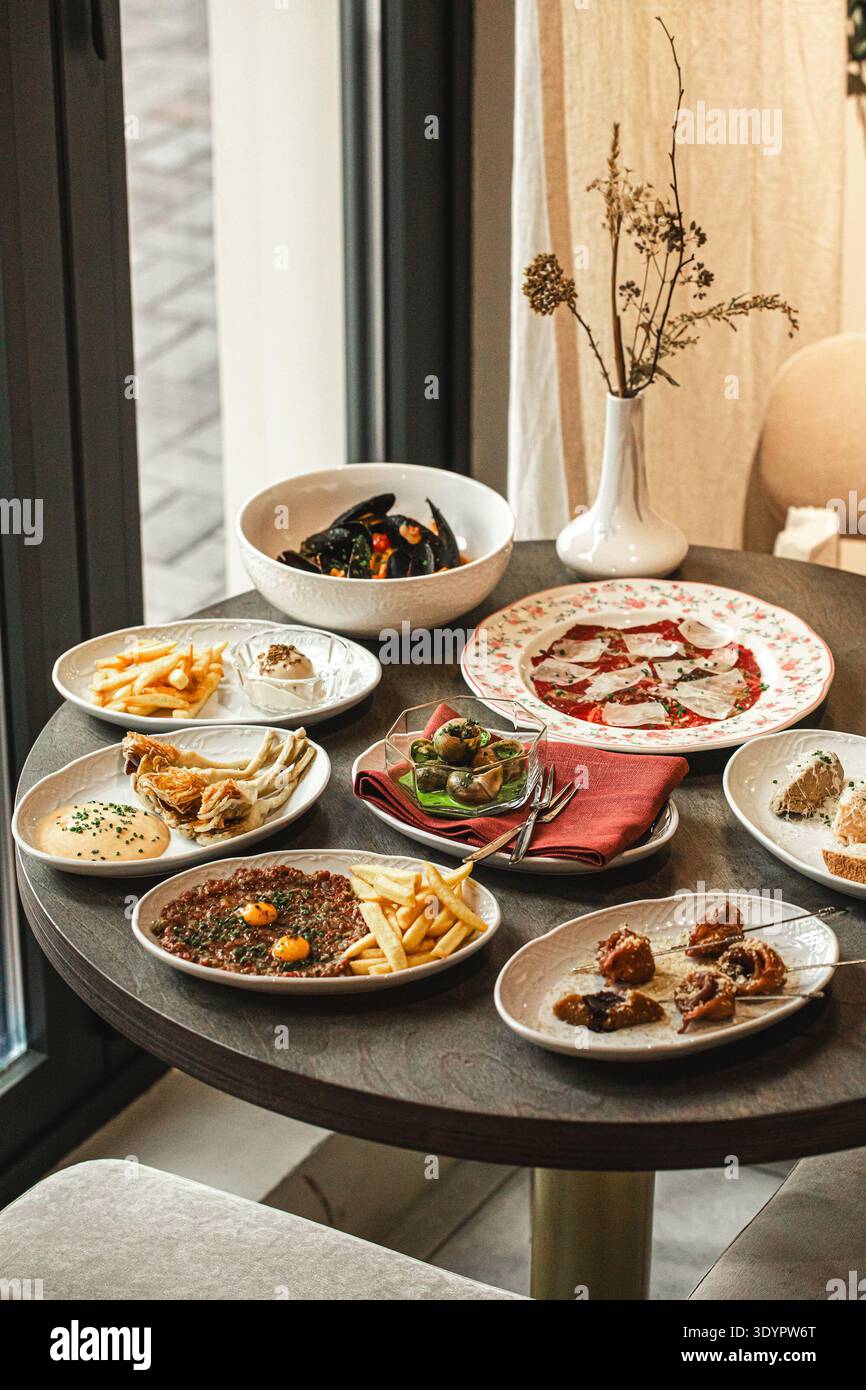 Assorted restaurant appetizers on table Stock Photo