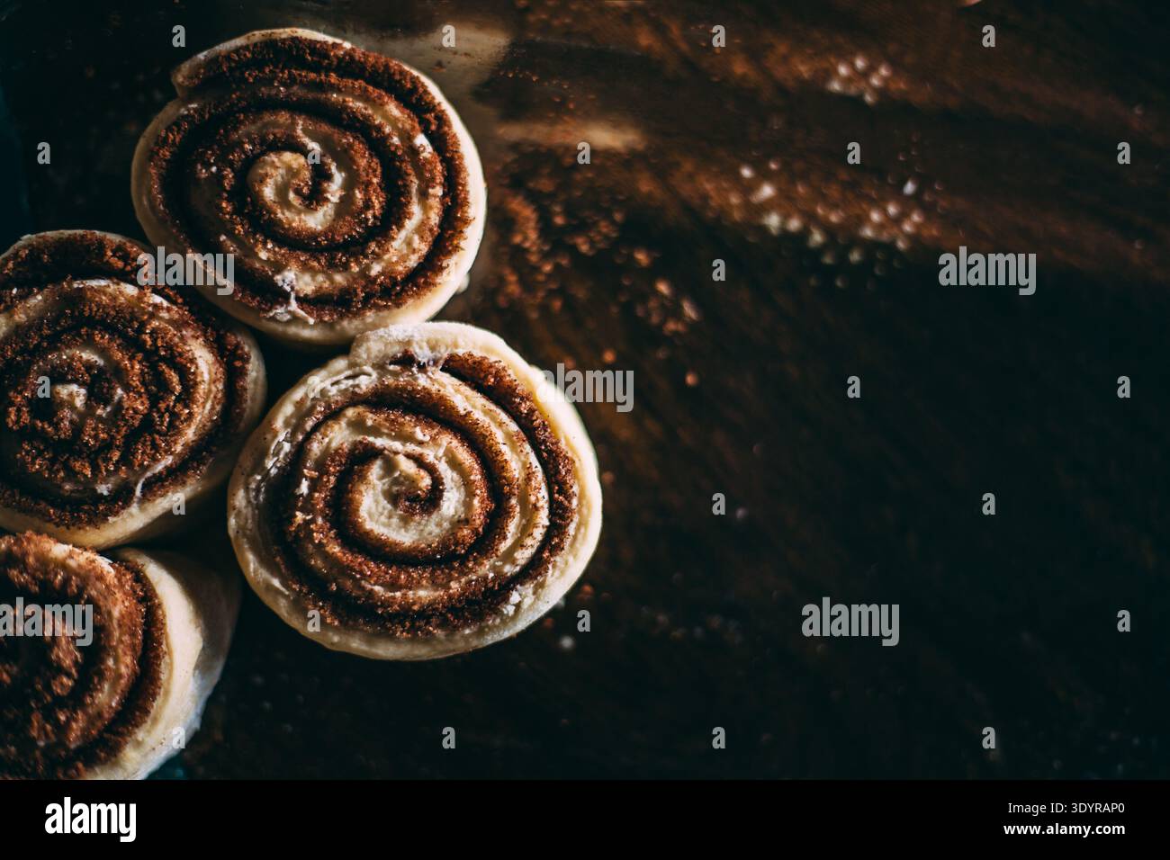 Unbaked Prepared Cinnamon Roll Bun Close-up Stock Photo